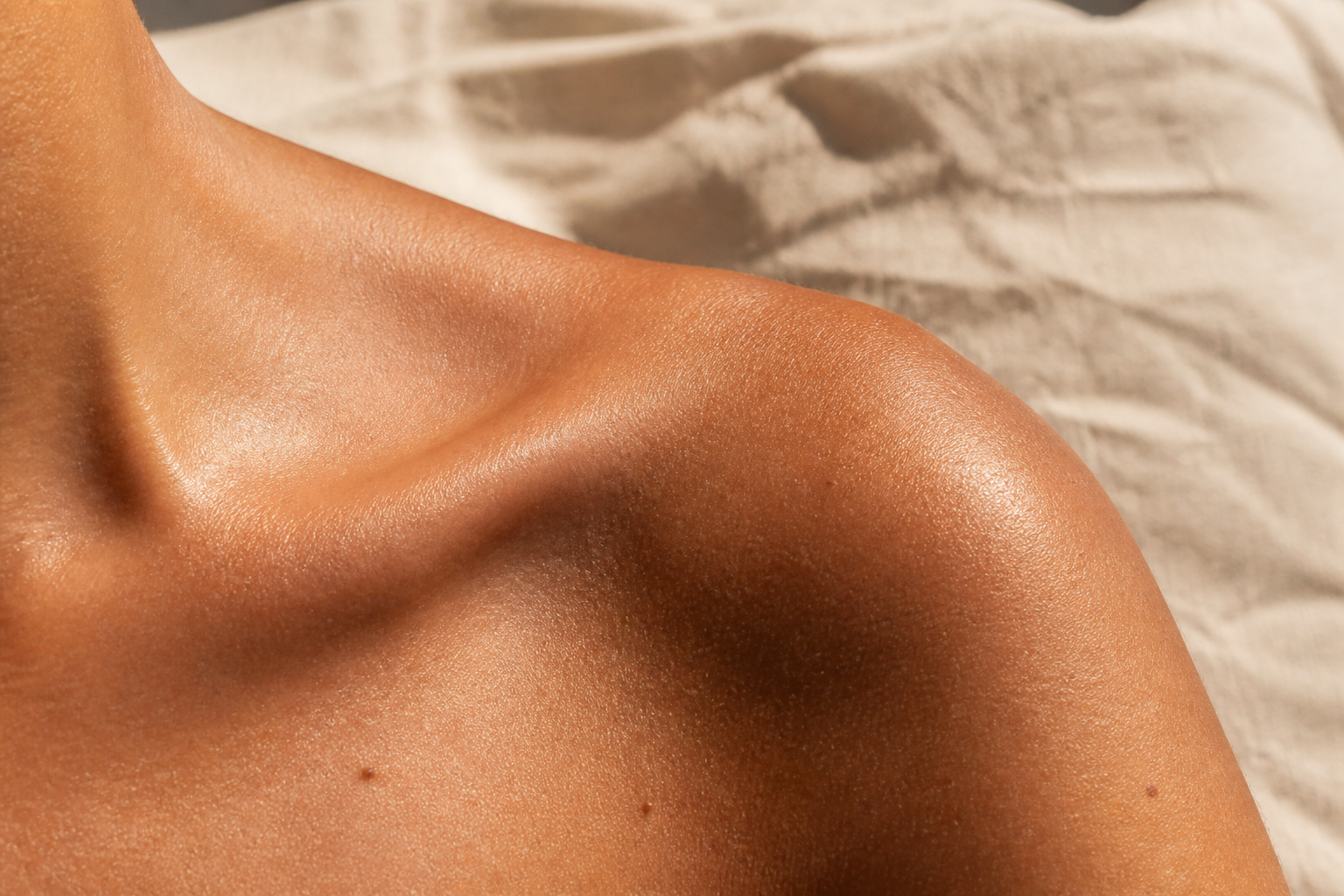 Close study of even, hydrated bronze skin